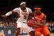 Dec. 22, 2012; New York, NY, USA; Syracuse Orange forward C.J. Fair (5) drives to the net as Temple Owls forward Anthony Lee (3) defends during the first half at Madison Square Garden. Mandatory Credit: Debby Wong-USA TODAY Sports