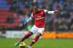 WIGAN, ENGLAND - DECEMBER 22: Theo Walcott of Arsenal in action during the Barclays Premier League match between Wigan Athletic and Arsenal at the DW Stadium on December 22, 2012 in Wigan, England. (Photo by Clive Brunskill/Getty Images)