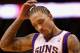 PHOENIX, AZ - DECEMBER 09: Michael Beasley #0 of the Phoenix Suns reacs during the NBA game against the Orlando Magic at US Airways Center on December 9, 2012 in Phoenix, Arizona. The Magic defeated the Suns 98-90. NOTE TO USER: User expressly acknowledges and agrees that, by downloading and or using this photograph, User is consenting to the terms and conditions of the Getty Images License Agreement. (Photo by Christian Petersen/Getty Images)