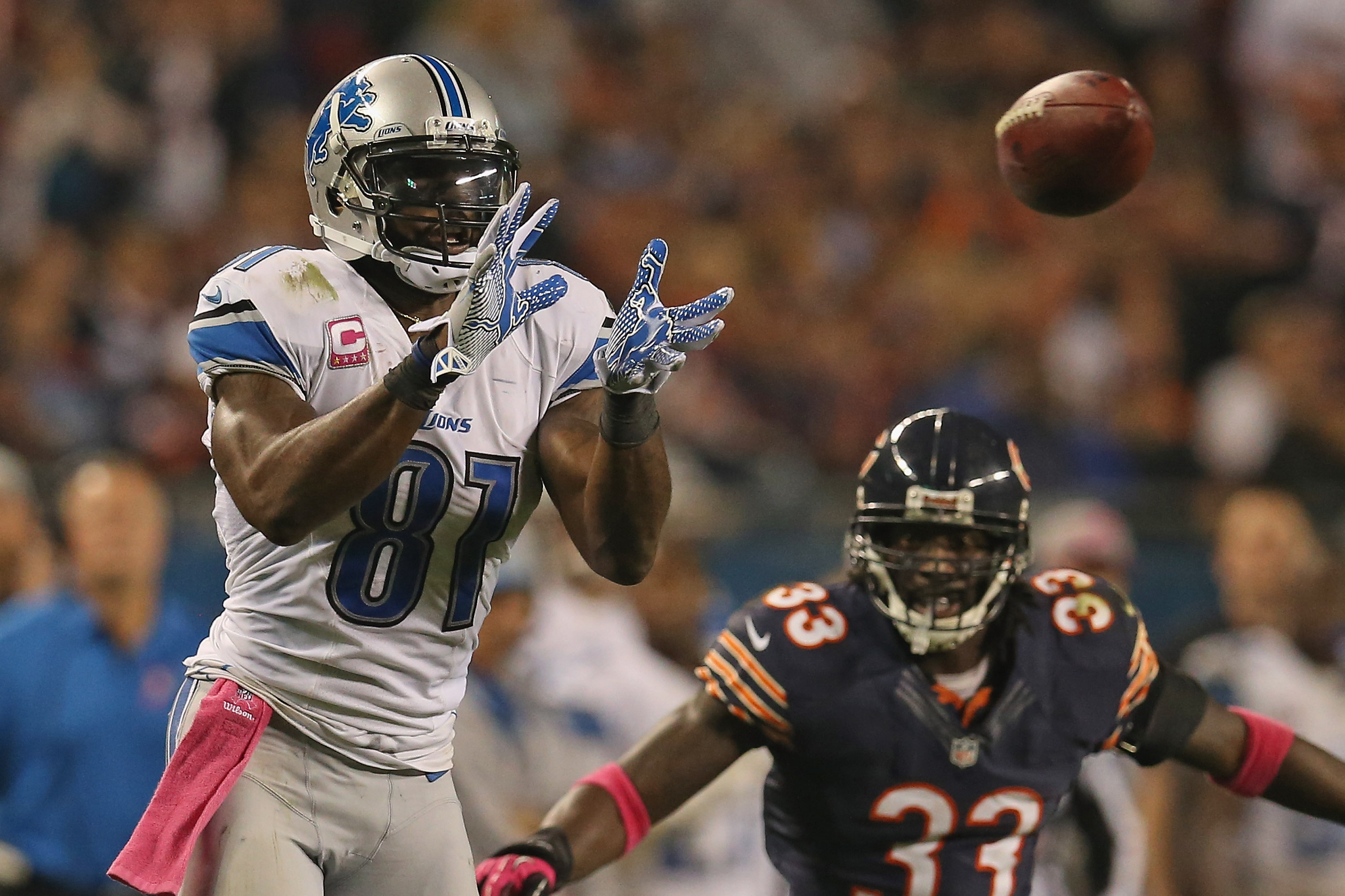 Photo: Detroit Lions Calvin Johnson reacts as he runs for an 87