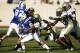 DURHAM, NC - NOVEMBER 14: Morgan Burnett #1 and a group of Georgia Tech Yellow Jackets defenders tackle Conner Vernon #2 of the Duke Blue Devils at Wallace Wade Stadium on November 14, 2009 in Durham, North Carolina. (Photo by Joe Robbins/Getty Images)