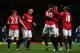 MANCHESTER, ENGLAND - DECEMBER 15: Wayne Rooney of Manchester United is congratulated by team mates after he scored the third goal during the Barclays Premier League match between Manchester United and Sunderland at Old Trafford on December 15, 2012 in Manchester, England. (Photo by Julian Finney/Getty Images)
