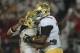 November 30, 2012; Stanford, CA, USA; UCLA Bruins running back Johnathan Franklin (left) is congratulated by offensive linesman Simon Goines (right) for scoring a touchdown during the third quarter of the Pac-12 Championship game against the Stanford Cardinal at Stanford Stadium. Mandatory Credit: Kelley L Cox-USA TODAY Sports