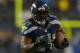 Dec 23, 2012; Seattle, WA, USA; Seattle Seahawks running back Marshawn Lynch (24) carries the ball on a 24-yard touchdown run in the first quarter against the San Francisco 49ers at CenturyLink Field. The Seahawks defeated the 49ers 42-13. Mandatory Credit: Kirby Lee/Image of Sport-USA TODAY Sports