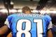 Dec 22, 2012; Detroit, MI, USA; Detroit Lions wide receiver Calvin Johnson (81) reacts after breaking the single season receiving yard record in a game against the Atlanta Falcons at Ford Field. Falcon won 31-18. Mandatory Credit: Mike Carter-USA TODAY Sports