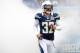 Dec 16, 2012; San Diego, CA, USA; San Diego Chargers free safety Eric Weddle (32) runs out of the smoke during pregame introduction before a game against the Carolina Panthers at Qualcomm Stadium. Mandatory Credit: Jake Roth-USA TODAY Sports