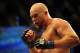 Jul 21, 2012; Calgary, AB, CANADA; Tim Boetsch (blue gloves) during the middleweight bout of UFC 149 against and Hector Lombard (not pictured) at the Scotiabank Saddledome. Mandatory Credit: Anne-Marie Sorvin-USA TODAY Sports