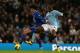 Marouane Fellaini does battle with fellow giant Yaya Toure of Manchester City