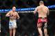 Nov 12, 2011; Anaheim, CA, USA; Junior Dos Santos (white trunks) and Cain Velasquez square off during a UFC championship bout at the Honda Center. Dos Santos won by knockout. Mandatory Credit: Gary A. Vasquez-USA TODAY Sports