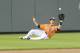 BALTIMORE, MD - APRIL 28: Nolan Reimold #14 of the Baltimore Orioles catches a fly ball by Cliff Pennington #2 of the Oakland Athletics during in the second inning of a baseball game at Oriole Park at Camden Yards on April 28, 2012 in Baltimore, Maryland. (Photo by Mitchell Layton/Getty Images)