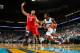 NEW ORLEANS, LA - OCTOBER 24: Roger Mason Jr. #8 of the New Orleans Hornets drives the ball around Royce White #30 of the Houston Rockets at New Orleans Arena on October 24, 2012 in New Orleans, Louisiana. NOTE TO USER: User expressly acknowledges and agrees that, by downloading and or using this photograph, User is consenting to the terms and conditions of the Getty Images License Agreement. (Photo by Chris Graythen/Getty Images)