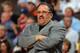 DENVER, CO - APRIL 22: Head coach Stan Van Gundy leads the Orlando Magic against the Denver Nuggets at Pepsi Center on April 22, 2012 in Denver, Colorado. The Nuggets defeated the Magic 101-74. NOTE TO USER: User expressly acknowledges and agrees that, by downloading and or using this photograph, User is consenting to the terms and conditions of the Getty Images License Agreement. (Photo by Doug Pensinger/Getty Images)