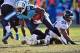 Darius Reynaud spins out of a tackle en route to one of two return touchdowns.