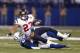 INDIANAPOLIS, IN - DECEMBER 30: Antoine Bethea #41 of the Indianapolis Colts tackles Arian Foster #23 of the Houston Texans during the game at Lucas Oil Stadium on December 30, 2012 in Indianapolis, Indiana. (Photo by Joe Robbins/Getty Images)