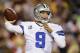 LANDOVER, MD - DECEMBER 30: Tony Romo #9 of the Dallas Cowboys drops back to pass during their game against the Washington Redskins at FedExField on December 30, 2012 in Landover, Maryland. (Photo by Rob Carr/Getty Images)