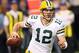 MINNEAPOLIS, MN - DECEMBER 30: Aaron Rodgers #12 of the Green Bay Packers runs out of the pocket against the Minnesota Vikings on December 30, 2012 at Mall of America Field at the Hubert H. Humphrey Metrodome in Minneapolis, Minnesota. (Photo by Andy Clayton King/Getty Images)