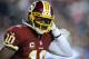 LANDOVER, MD - DECEMBER 30: Robert Griffin III #10 of the Washington Redskins looks on during their game against the Dallas Cowboys at FedExField on December 30, 2012 in Landover, Maryland. (Photo by Patrick McDermott/Getty Images)