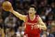 Dec 28, 2012; San Antonio, TX, USA; Houston Rockets guard Jeremy Lin (7) chases down a loose ball during the first half against the San Antonio Spurs at the AT&T Center. Mandatory Credit: Soobum Im-USA TODAY Sports