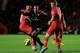 SOUTHAMPTON, ENGLAND - JANUARY 01: Theo Walcott of Arsenal goes past James Ward-Prowse of Southampton during the Barclays Premier league match between Southampton and Arsenal at St Mary's Stadium on January 1, 2013 in Southampton, England. (Photo by Richard Heathcote/Getty Images)