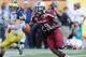 TAMPA, FL - JANUARY 1: Wide receiver Bruce Ellington #23 of the South Carolina Gamecocks grabs a 32-yard, game-winning touchdown pass in the fourth quarter against the Michigan Wolverines in the Outback Bowl January 1, 2013 at Raymond James Stadium in Tampa, Florida. South Carolina won 33 - 28. (Photo by Al Messerschmidt/Getty Images)