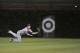 CHICAGO, IL - JUNE 26: Center fielder Kirk Nieuwenhuis #9 of the New York Mets dives for but cannot catch a single hit by Starlin Castro #13 of the Chicago Cubs during the fourth inning at Wrigley Field on June 26, 2012 in Chicago, Illinois. (Photo by Brian Kersey/Getty Images)
