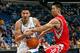 NEW ORLEANS, LA - OCTOBER 24: Greivis Vasquez #21 of the New Orleans Hornets fights for a ball with Jeremy Lin #7 of the Houston Rockets at New Orleans Arena on October 24, 2012 in New Orleans, Louisiana. NOTE TO USER: User expressly acknowledges and agrees that, by downloading and or using this photograph, User is consenting to the terms and conditions of the Getty Images License Agreement. (Photo by Chris Graythen/Getty Images)
