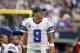 Dec 23, 2012; Arlington, TX, USA; Dallas Cowboys quarterback Tony Romo (9) watches a play while on the sidelines during the game against the New Orleans Saints at Cowboys Stadium. The Saints beat the Cowboys 34-31 in overtime. Mandatory Credit: Tim Heitman-USA TODAY Sports