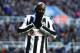 NEWCASTLE UPON TYNE, ENGLAND - DECEMBER 15: Demba Ba of Newcastle United reacts to a missed chance during the Barclays Premier League match between Newcastle United and Manchester City at St James' Park on December 15, 2012 in Newcastle upon Tyne, England. (Photo by Laurence Griffiths/Getty Images)