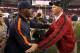 GLENDALE, AZ - DECEMBER 23: Head coaches Lovie Smith of the Chicago Bears and Ken Whisenhunt of the Arizona Cardinals shake hands following the NFL game at the University of Phoenix Stadium on December 23, 2012 in Glendale, Arizona. The Bears defeated the Cardinals 28-13. (Photo by Christian Petersen/Getty Images)