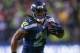 SEATTLE, WA - DECEMBER 23: Running back Marshawn Lynch #24 of the Seattle Seahawks rushes against the San Francisco 49ers at CenturyLink Field on December 23, 2012 in Seattle, Washington. (Photo by Otto Greule Jr/Getty Images)