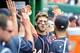WASHINGTON, DC - SEPTEMBER 03: Bryce Harper #34 of the Washington Nationals celebrates with teammates after scoring in the eighth inning against the Chicago Cubs at Nationals Park on September 3, 2012 in Washington, DC. Washington won the game 2-1. (Photo by Greg Fiume/Getty Images)