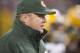 GREEN BAY, WI - December 9: Mike McCarthy head coach of the Green Bay Packers takes the field as snow falls before the start of the Detroit Lions v Green Bay Packers game at Lambeau Field on December 9, 2012 in Green Bay, Wisconsin. (Photo by Tom Lynn /Getty Images)