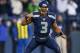 SEATTLE, WA - DECEMBER 30: Quarterback Russell Wilson #3 of the Seattle Seahawks celebrates an apparent touchdown by running back Marshawn Lynch with under two minutes remaining against the St. Louis Rams at CenturyLink Field on December 30, 2012 in Seattle, Washington. The play was challenged and reversed, but the Seahawks defeated the Rams 20-13. (Photo by Otto Greule Jr/Getty Images)