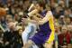 December 26, 2012; Denver, CO, USA; Los Angeles Lakers forward Pau Gasol (right) is fouled by Denver Nuggets forward Corey Brewer (left) during the second half at the Pepsi Center. The Nuggets won 126-114. Mandatory Credit: Chris Humphreys-USA TODAY Sports
