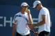 NEW YORK - SEPTEMBER 02: Sam Querrey and John Isner of the United States talk during their match against Wayne Odesnik and Michael Shabaz of the United States during day three of the 2009 U.S. Open at the USTA Billie Jean King National Tennis Center on September 2, 2009 in Flushing neighborhood of the Queens borough of New York City. (Photo by Nick Laham/Getty Images)
