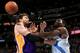 DENVER, CO - DECEMBER 26: Pau Gasol #16 of the Los Angeles Lakers and Kenneth Faried #35 of the Denver Nuggets battle for a loose ball at Pepsi Center on December 26, 2012 in Denver, Colorado. The Nuggets defeated the Lakers 126-114. NOTE TO USER: User expressly acknowledges and agrees that, by downloading and or using this photograph, User is consenting to the terms and conditions of the Getty Images License Agreement. (Photo by Doug Pensinger/Getty Images)