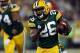 GREEN BAY, WI - JANUARY 05: Running back DuJuan Harris #26 of the Green Bay Packers runs the ball in the first quarter against the Minnesota Vikings during the NFC Wild Card Playoff game at Lambeau Field on January 5, 2013 in Green Bay, Wisconsin. (Photo by Jonathan Daniel/Getty Images)