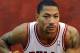 October 1, 2012; Chicago, IL, USA; Chicago Bulls point guard Derrick Rose (1) poses for photos during Chicago Bulls media day at the Berto Center. Mandatory Credit: David Banks-USA TODAY Sports