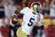 LOS ANGELES, CA - NOVEMBER 24: Quarterback Everett Golson #5 of the Notre Dame Fighting Irish carries the ball against the USC Trojans at Los Angeles Memorial Coliseum on November 24, 2012 in Los Angeles, California. (Photo by Jeff Gross/Getty Images)