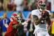 ATLANTA, GA - DECEMBER 01: Wide receiver Amari Cooper #9 of the Alabama Crimson Tide catches a fourth quarter touchdown pass in front of defensive back Damian Swann #5 of the Georgia Bulldogs during the SEC Championship Game at the Georgia Dome on December 1, 2012 in Atlanta, Georgia. (Photo by Mike Ehrmann/Getty Images)