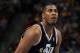 DENVER, CO - NOVEMBER 09: Derrick Favors #15 of the Utah Jazz takes a free throw against the Denver Nuggets at the Pepsi Center on November 9, 2012 in Denver, Colorado. The Nuggets defeated the Jazz 104-84. NOTE TO USER: User expressly acknowledges and agrees that, by downloading and or using this photograph, User is consenting to the terms and conditions of the Getty Images License Agreement. (Photo by Doug Pensinger/Getty Images)