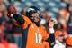 DENVER, CO - DECEMBER 30: Quarterback Peyton Manning #18 of the Denver Broncos warms up before a game against the Kansas City Chiefs at Sports Authority Field Field at Mile High on December 30, 2012 in Denver, Colorado. (Photo by Dustin Bradford/Getty Images)