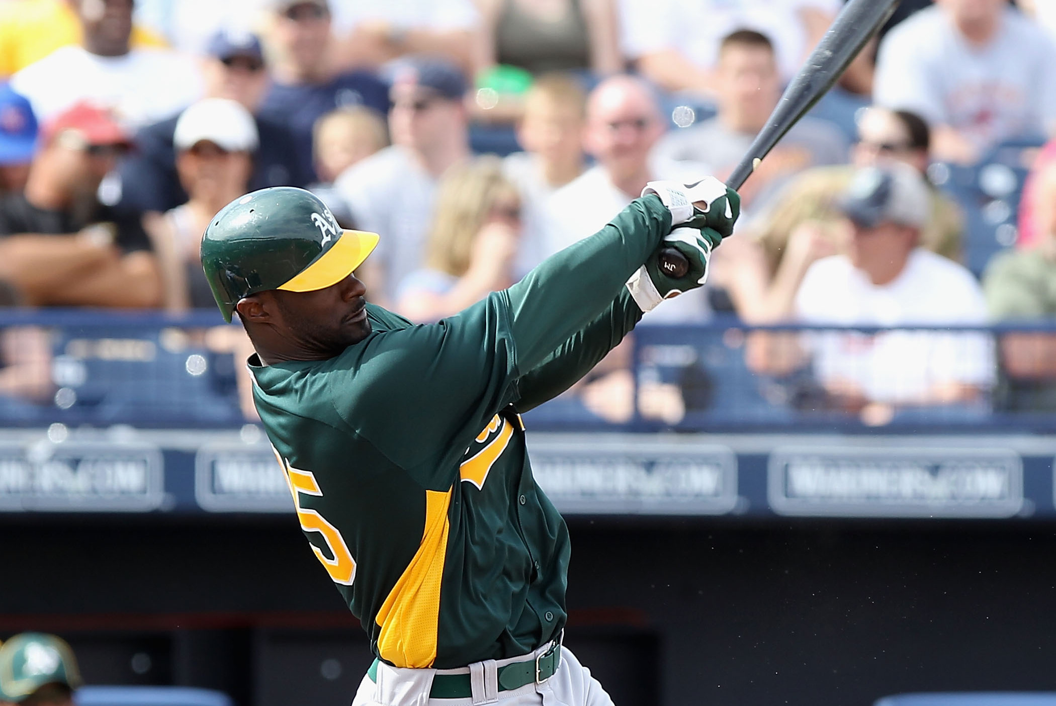 Jai Miller of the Oakland Athletics crosses home plate after