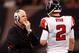 NEW ORLEANS - DECEMBER 07: Head coach Mike Smith talks with quarterback Matt Ryan #2 of the Atlanta Falcons throws a pass against the New Orleans Saints on December 7, 2008 at the Superdome in New Orleans, Louisiana. The Saints defeated the Falcons 29-25. (Photo by Chris Graythen/Getty Images)