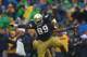 SOUTH BEND, IN - OCTOBER 13: Kapron Lewis-Moore #89 and Matthias Farley #41 of the Notre Dame Fighting Irish celebrate a blocking field goal against the Standford Cardinal at Notre Dame Stadium on October 13, 2012 in South Bend, Indiana. Notre Dame defeated Stanford 20-13 in overtime. (Photo by Jonathan Daniel/Getty Images)