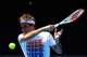 MELBOURNE, AUSTRALIA - JANUARY 08: Roger Federer of Switzerland plays a forehand during practice ahead of the 2013 Australian Open at Melbourne Park on January 8, 2013 in Melbourne, Australia. (Photo by Quinn Rooney/Getty Images)