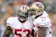 GREEN BAY, WI - SEPTEMBER 09: NaVorro Bowman #53 of the San Francisco 49ers celebrates with with Ahmad Brooks #55 after intercepting a pass during the NFL season opener against the Green Bay Packers at Lambeau Field on September 9, 2012 in Green Bay, Wisconsin. (Photo by Andy Lyons/Getty Images)