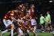 BRADFORD, ENGLAND - JANUARY 08: Carl McHugh of Bradford City (grounded) celebrates with team mates after scoring their third goal during the Capital One Cup Semi-Final 1st Leg match between Bradford City and Aston Villa at Coral Windows Stadium, Valley Parade on January 8, 2013 in Bradford, England. (Photo by Alex Livesey/Getty Images)