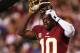 LANDOVER, MD - JANUARY 06: Robert Griffin III #10 of the Washington Redskins takes off his helmet during their NFC Wild Card Playoff Game against the Seattle Seahawks at FedExField on January 6, 2013 in Landover, Maryland. (Photo by Win McNamee/Getty Images)