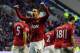 WIGAN, ENGLAND - JANUARY 01: Robin Van Persie of Manchester United celebrates scoring his side's second goal during the Barclays Premier League match between Wigan Athletic and Manchester United at DW Stadium on January 1, 2013 in Wigan, England. (Photo by Chris Brunskill/Getty Images)